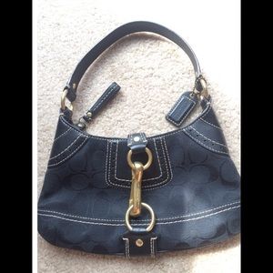 Coach Handbag. Never used. Black with gold.